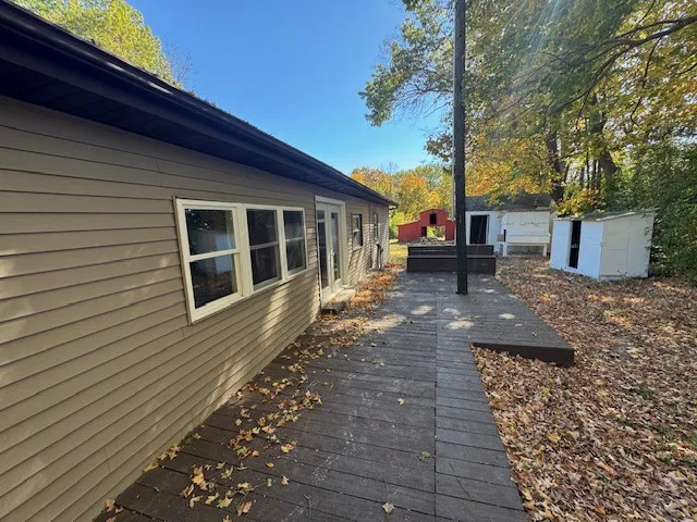 a view of a yard with an outdoor space