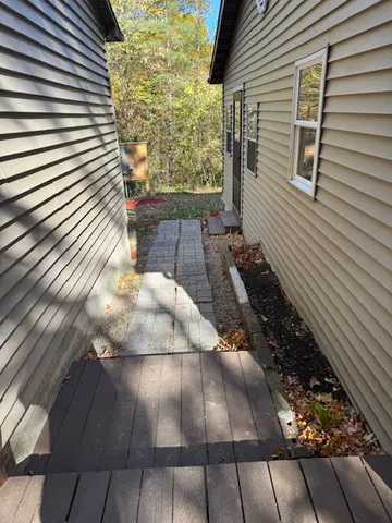 a view of a yard with a tree