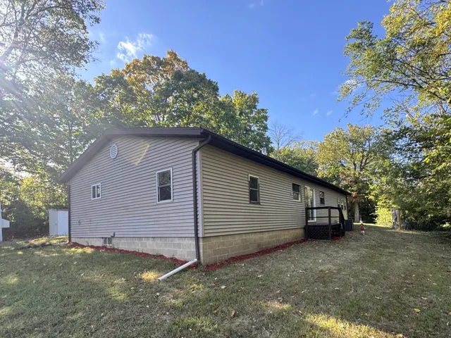 a house view with a backyard space