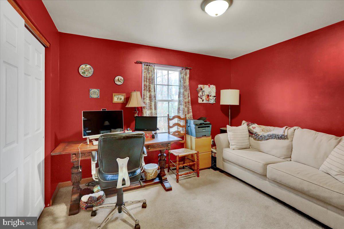 1060 Shelbourne Road Reading, PA 19606 - Photo 23 of 30 a living room with furniture and a flat screen tv