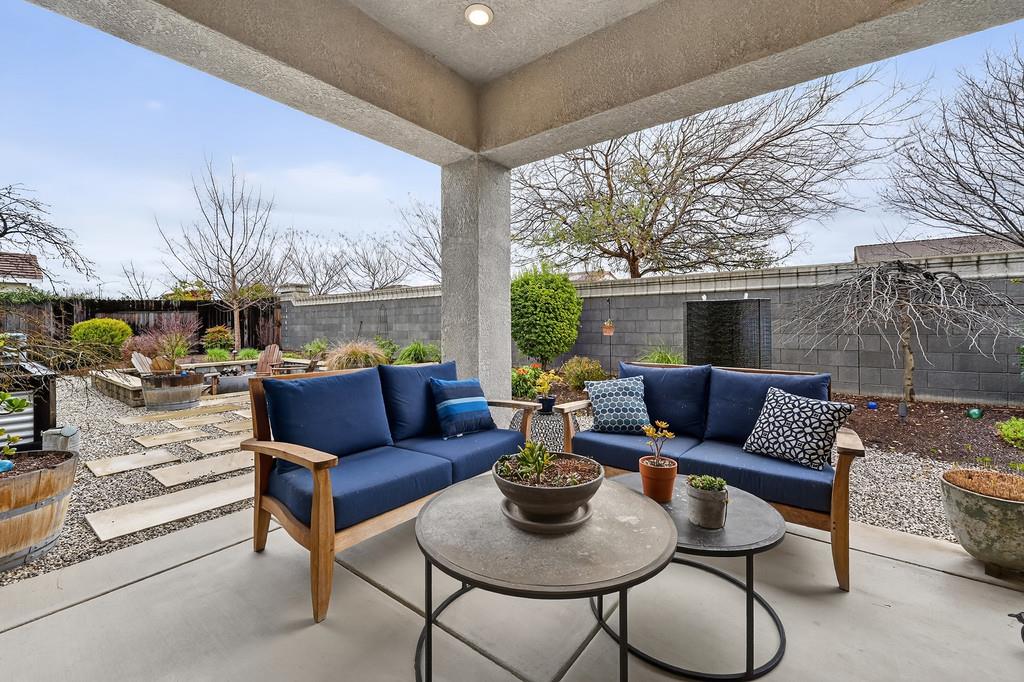 3900 Fenway Circle Rocklin, CA 95677 - Photo 47 of 57 Fully landscaped backyard- covered & uncovered patio areas.
