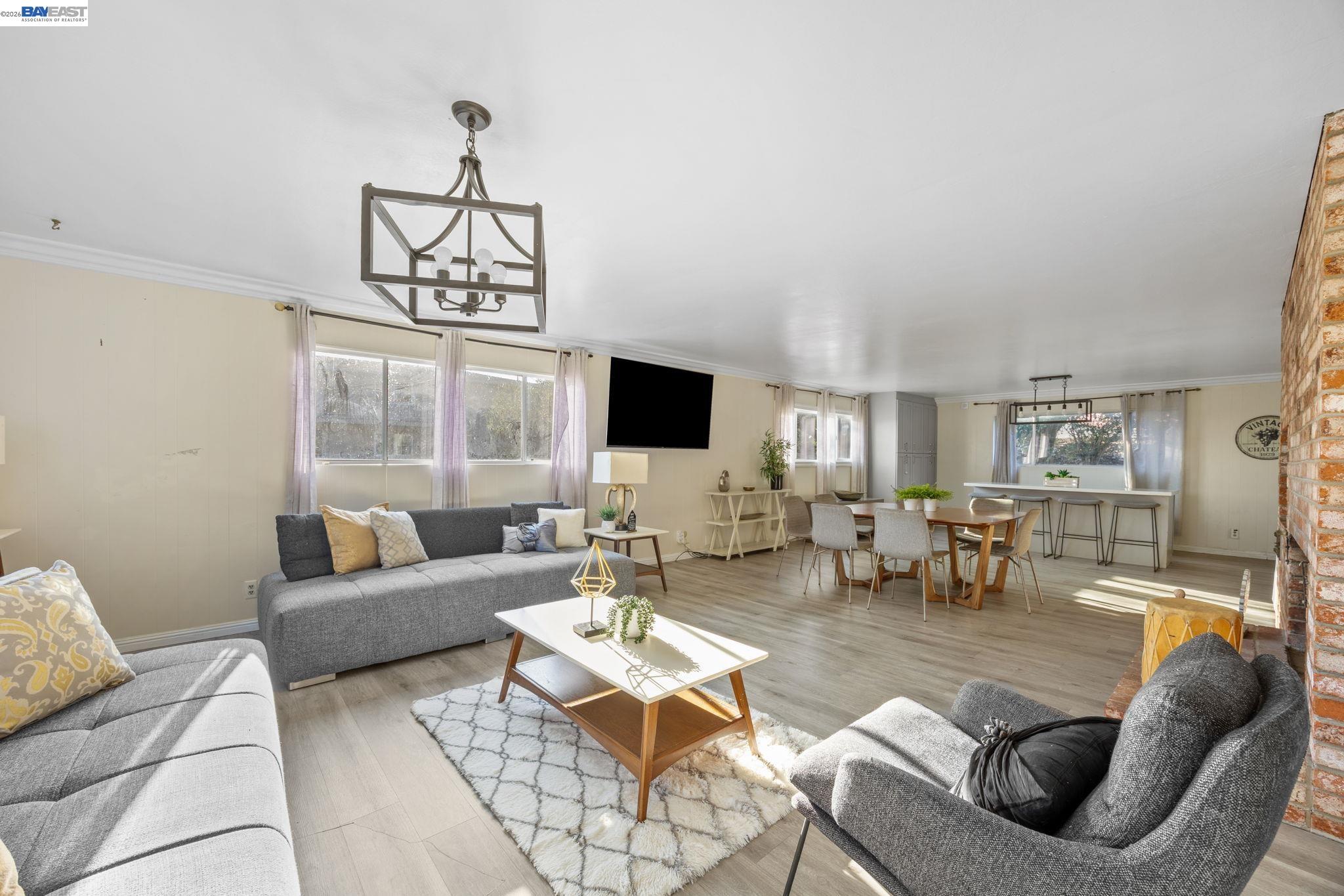 2245 Sol Street Castro Valley, CA 94578 - Photo 24 of 36 a living room with furniture and a flat screen tv