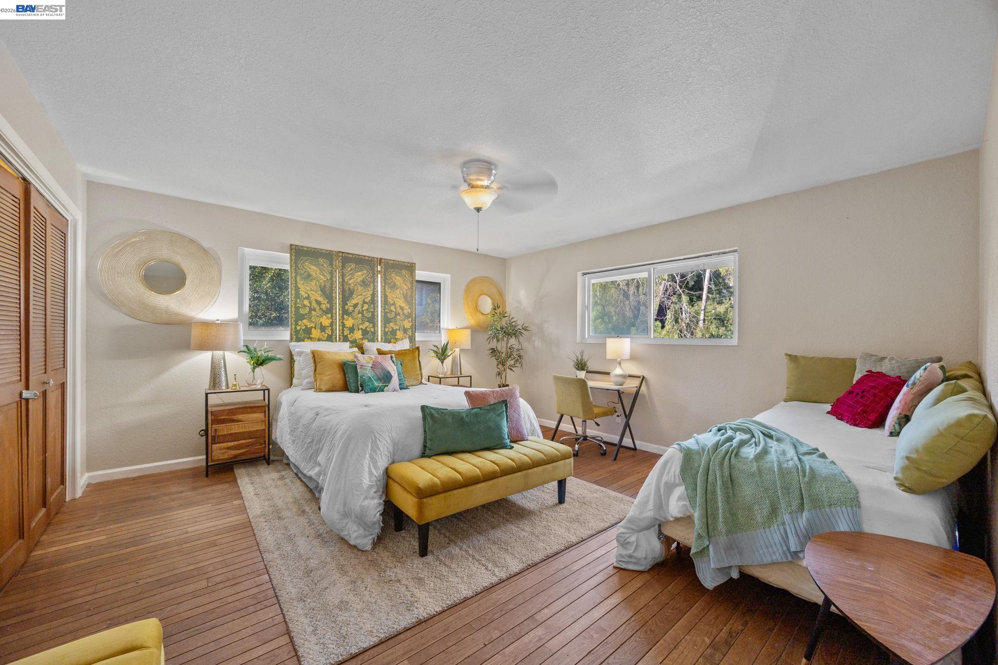2245 Sol Street Castro Valley, CA 94578 - Photo 27 of 36 a living room with furniture and a wooden floor