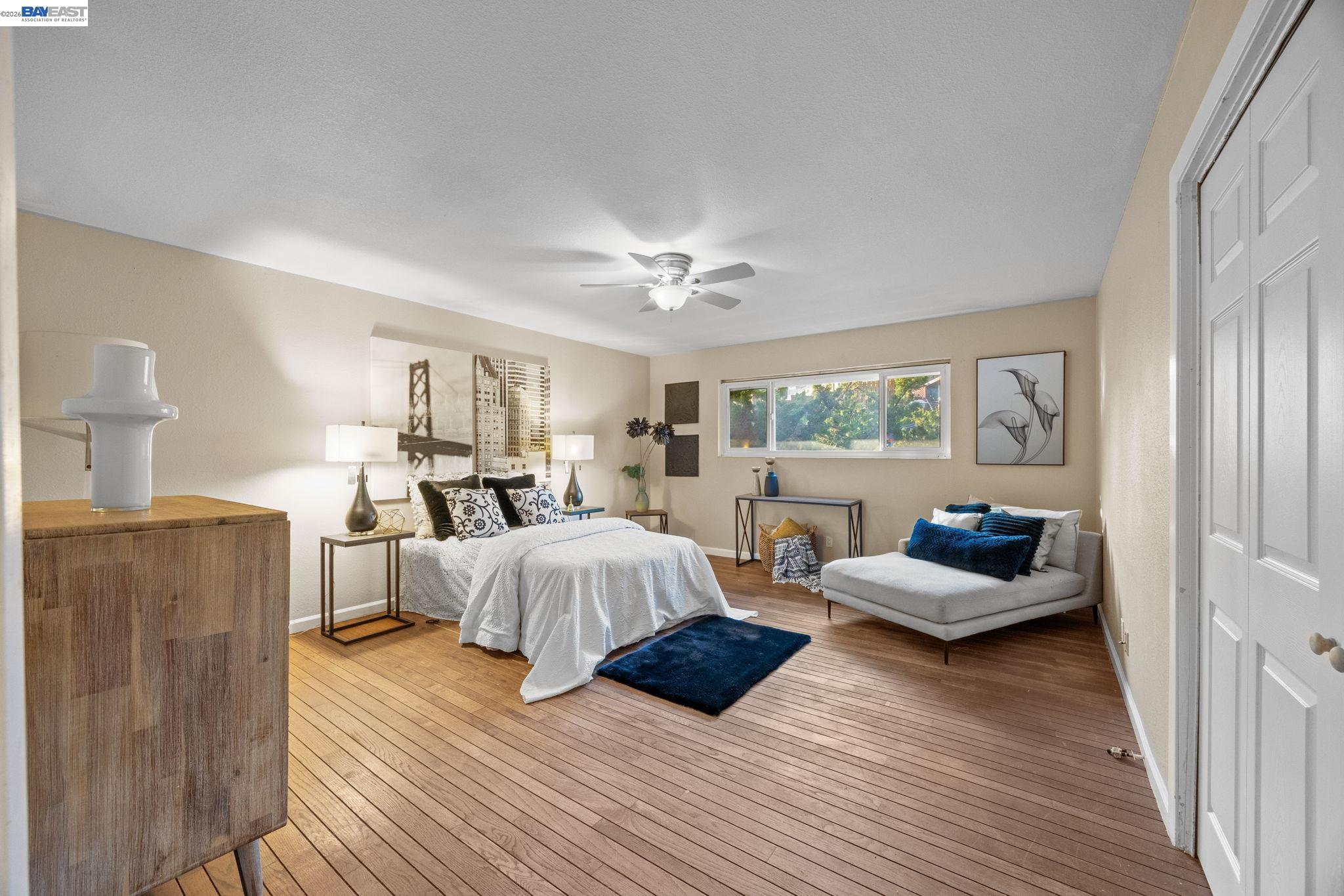 2245 Sol Street Castro Valley, CA 94578 - Photo 28 of 36 a living room with furniture and wooden floor