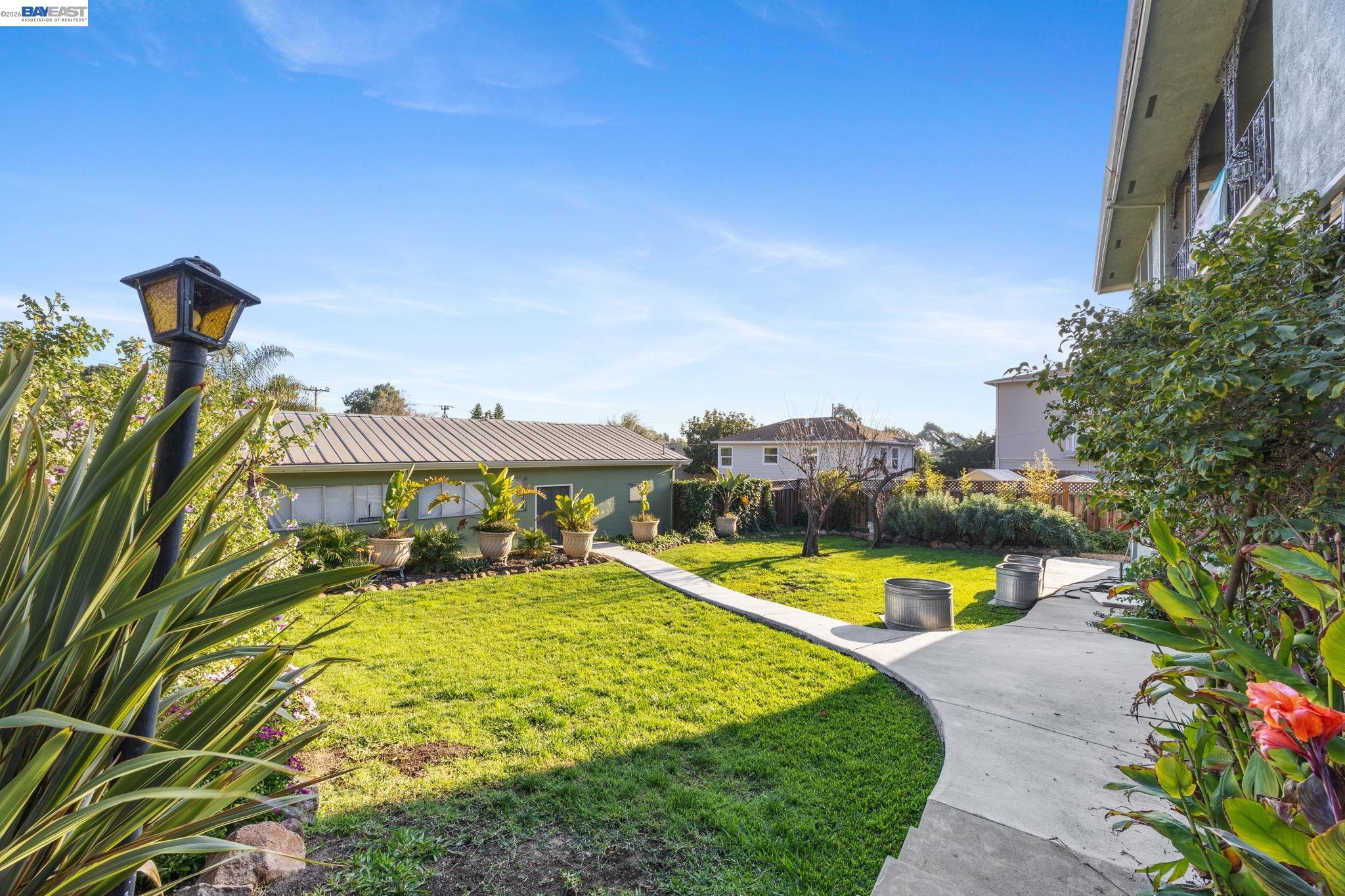 2245 Sol Street Castro Valley, CA 94578 - Photo 3 of 36 a view of a swimming pool with a patio and a yard