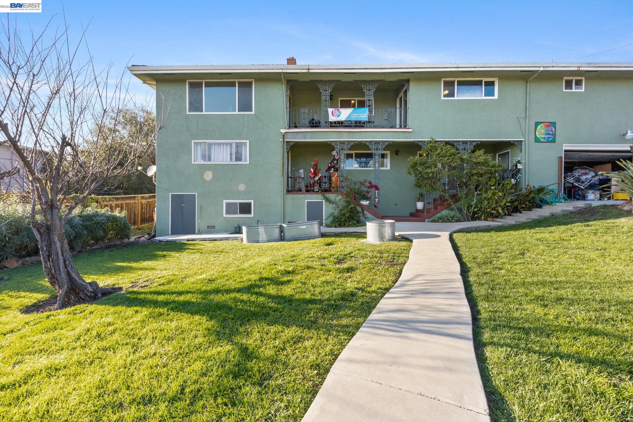 2245 Sol Street Castro Valley, CA 94578 - Photo 4 of 36 a front view of a house with a yard
