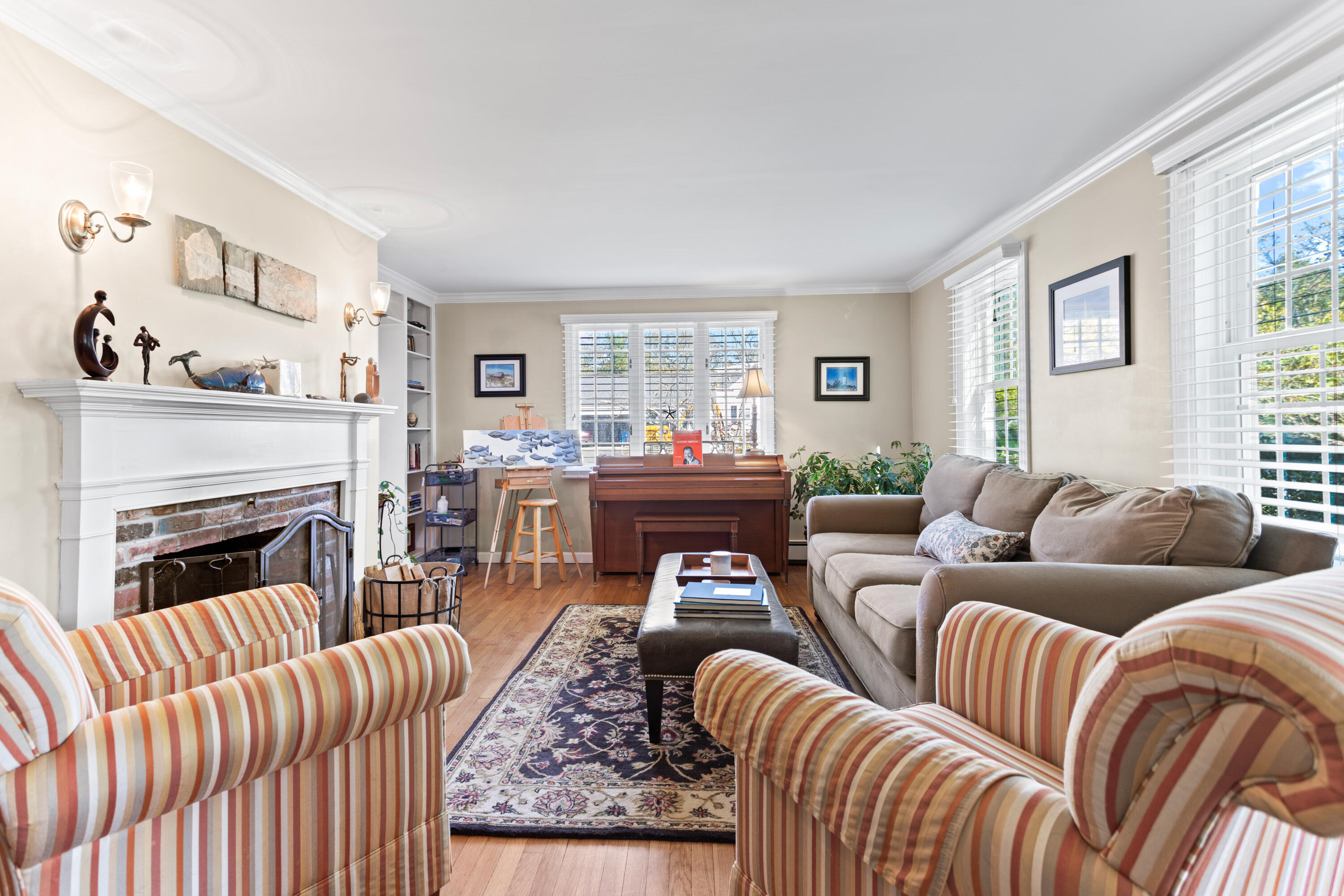 85 Stonehedge Road Barnstable, MA 02630 - Photo 14 of 41 a living room with furniture fireplace and window