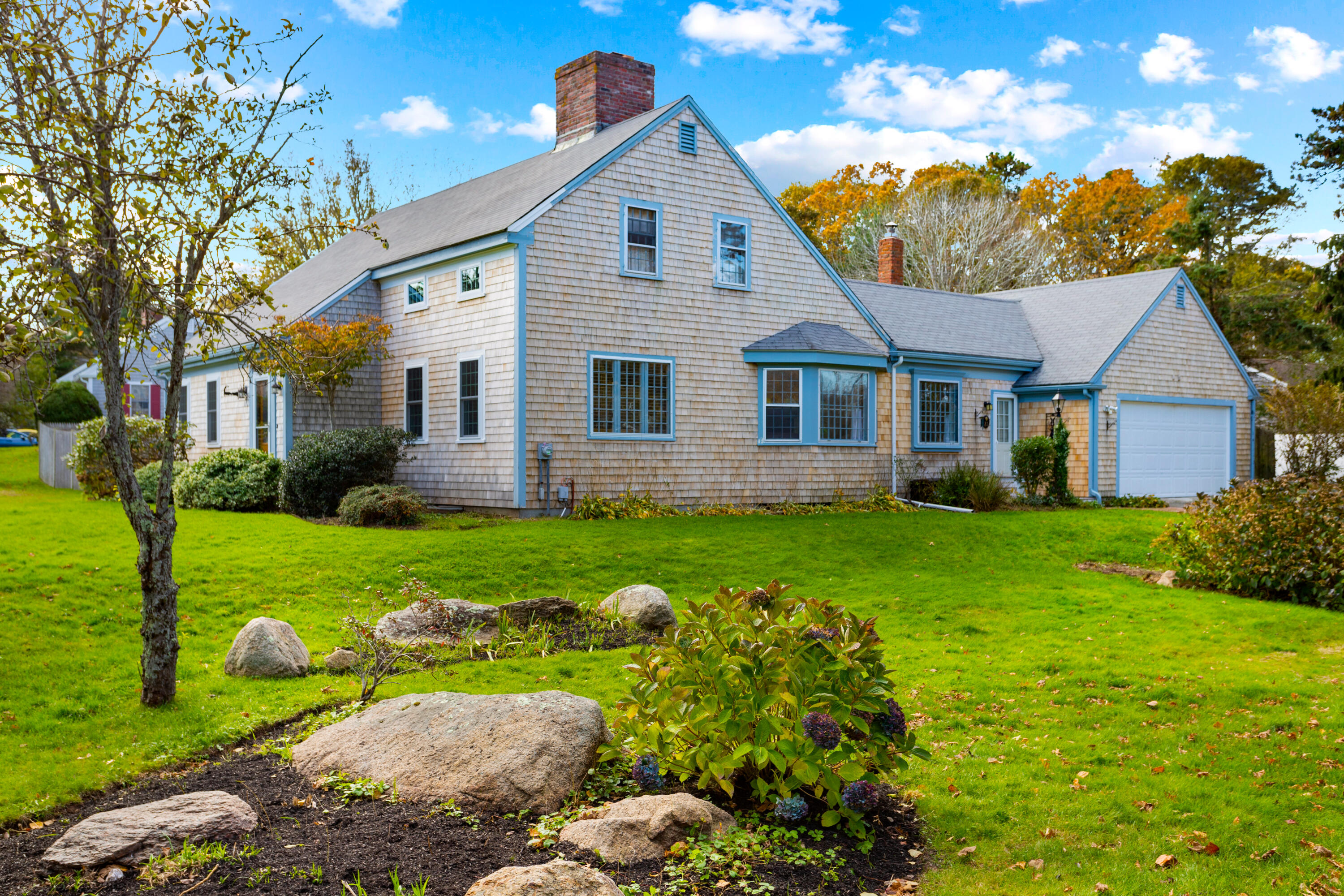 85 Stonehedge Road Barnstable, MA 02630 - Photo 2 of 41 a front view of house with yard and green space