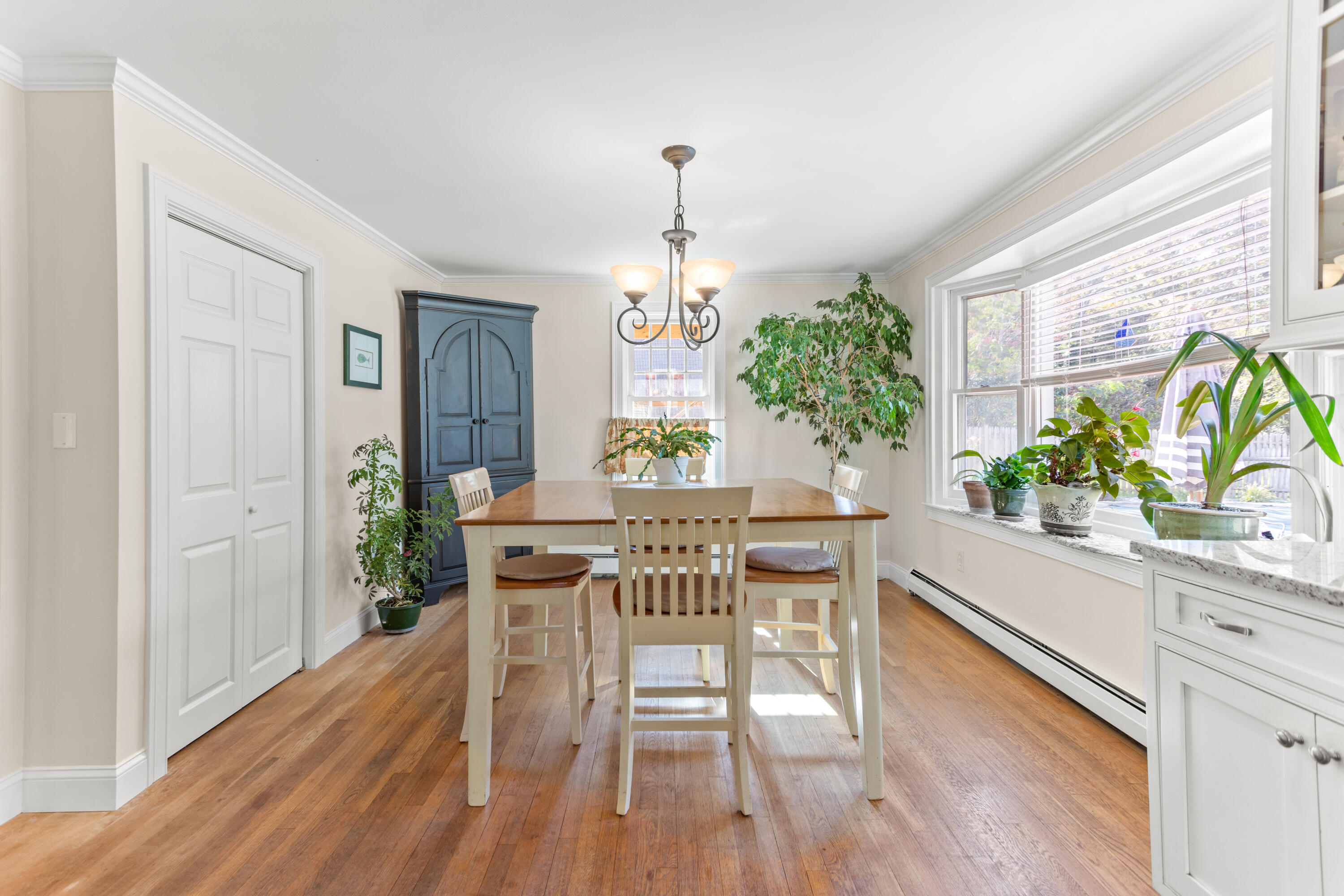 85 Stonehedge Road Barnstable, MA 02630 - Photo 23 of 41 a view of a dining room with furniture window and wooden floor