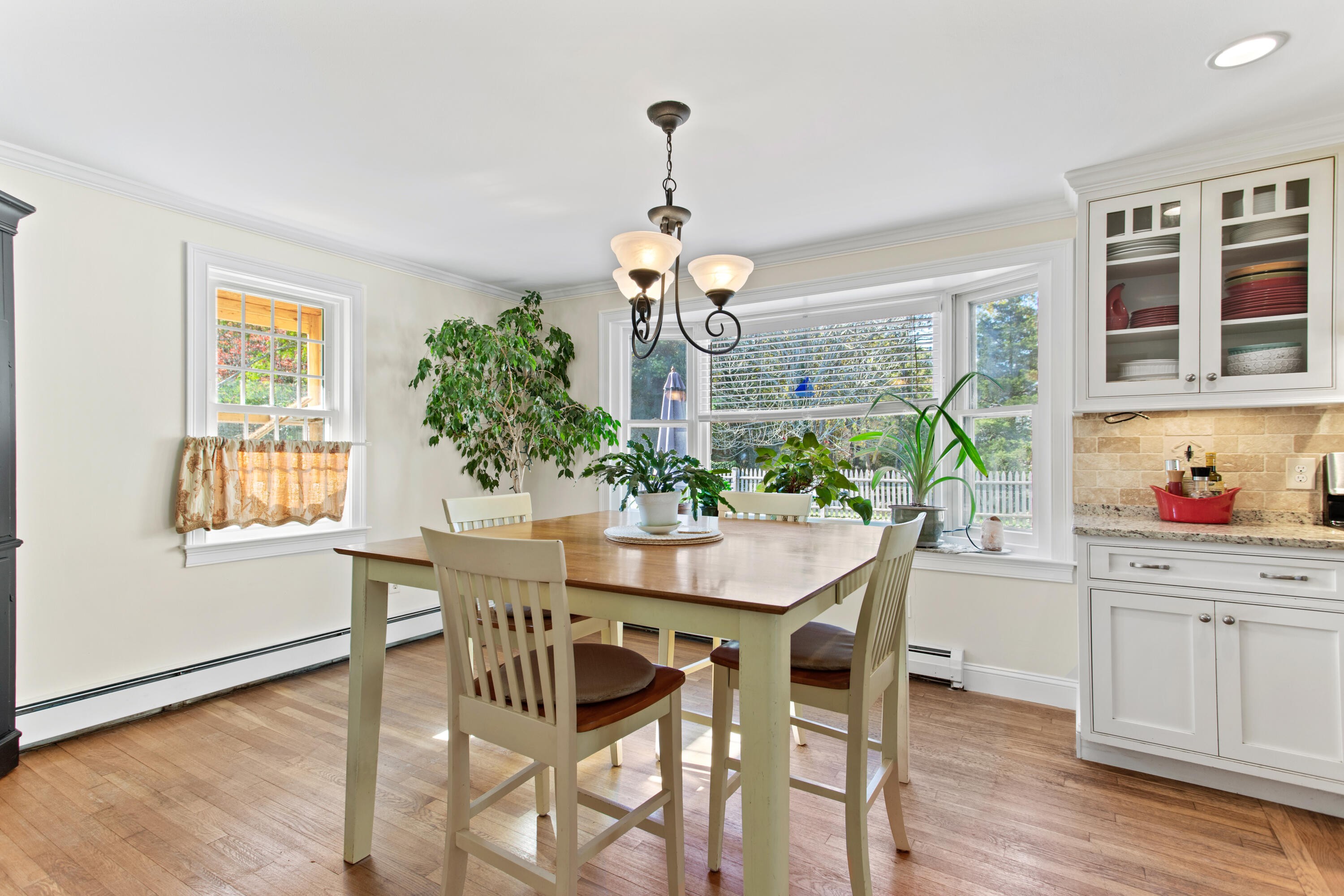 85 Stonehedge Road Barnstable, MA 02630 - Photo 24 of 41 a view of a dining room with furniture window and wooden floor