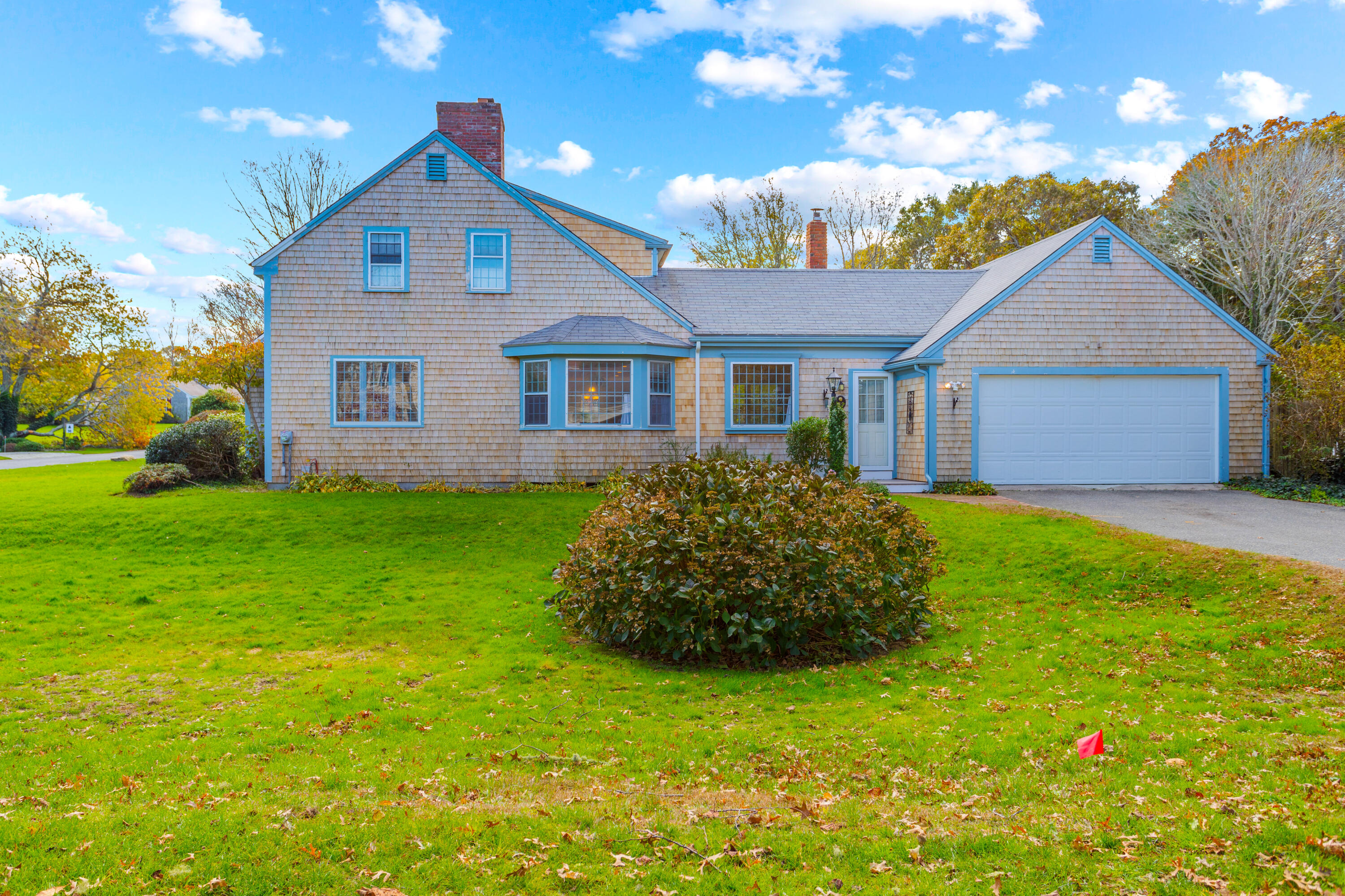 85 Stonehedge Road Barnstable, MA 02630 - Photo 3 of 41 a front view of a house with a garden