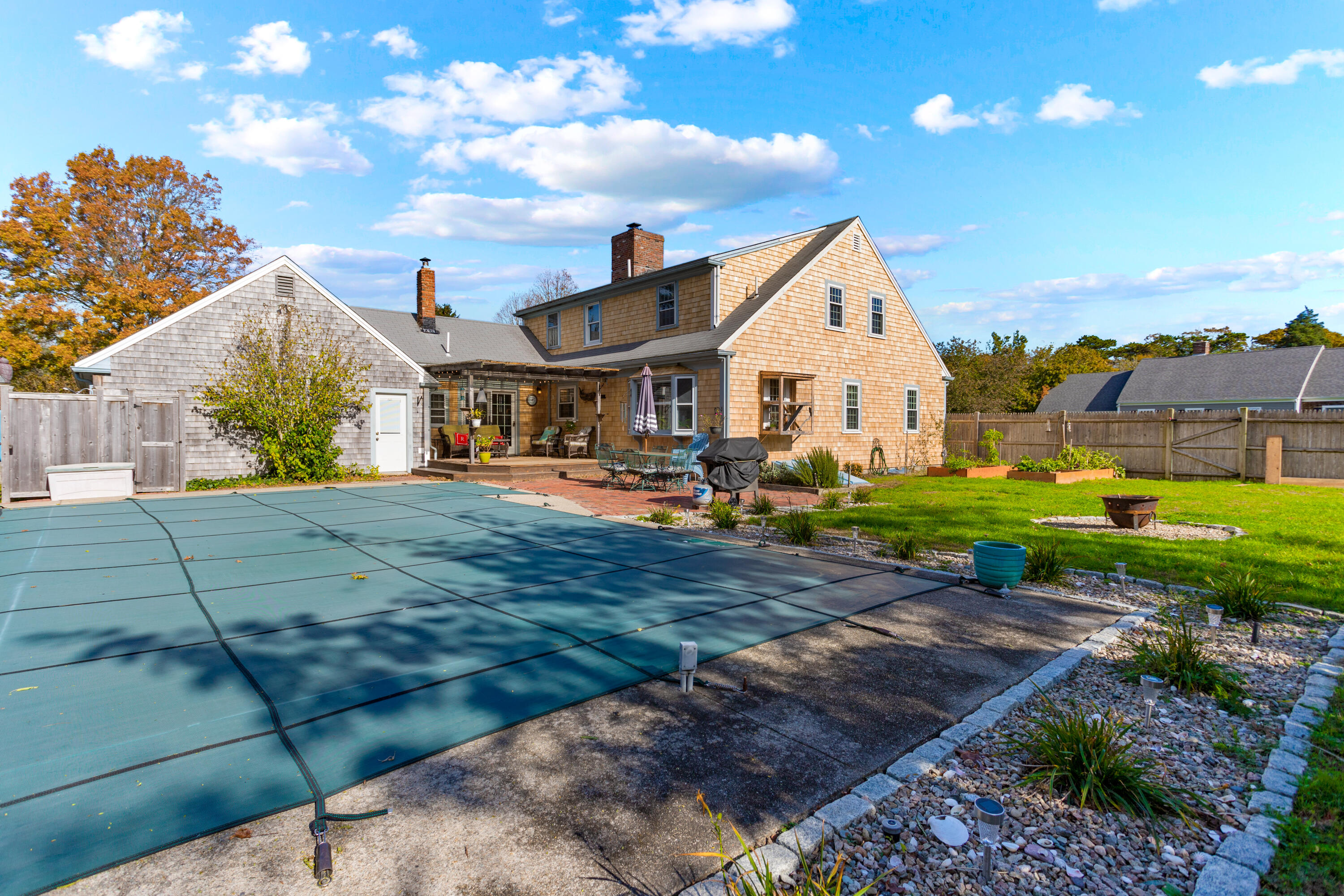 85 Stonehedge Road Barnstable, MA 02630 - Photo 10 of 41 a front view of a house with a yard