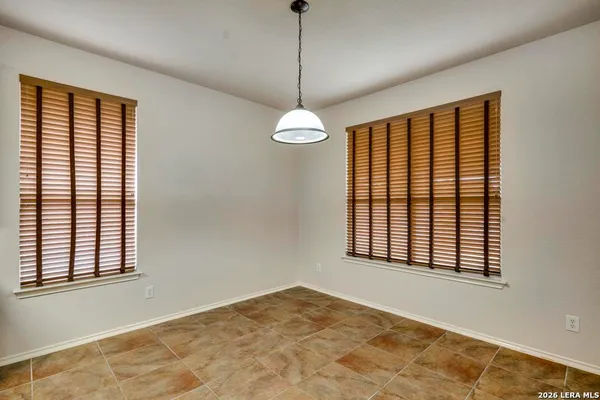 a view of a room with windows