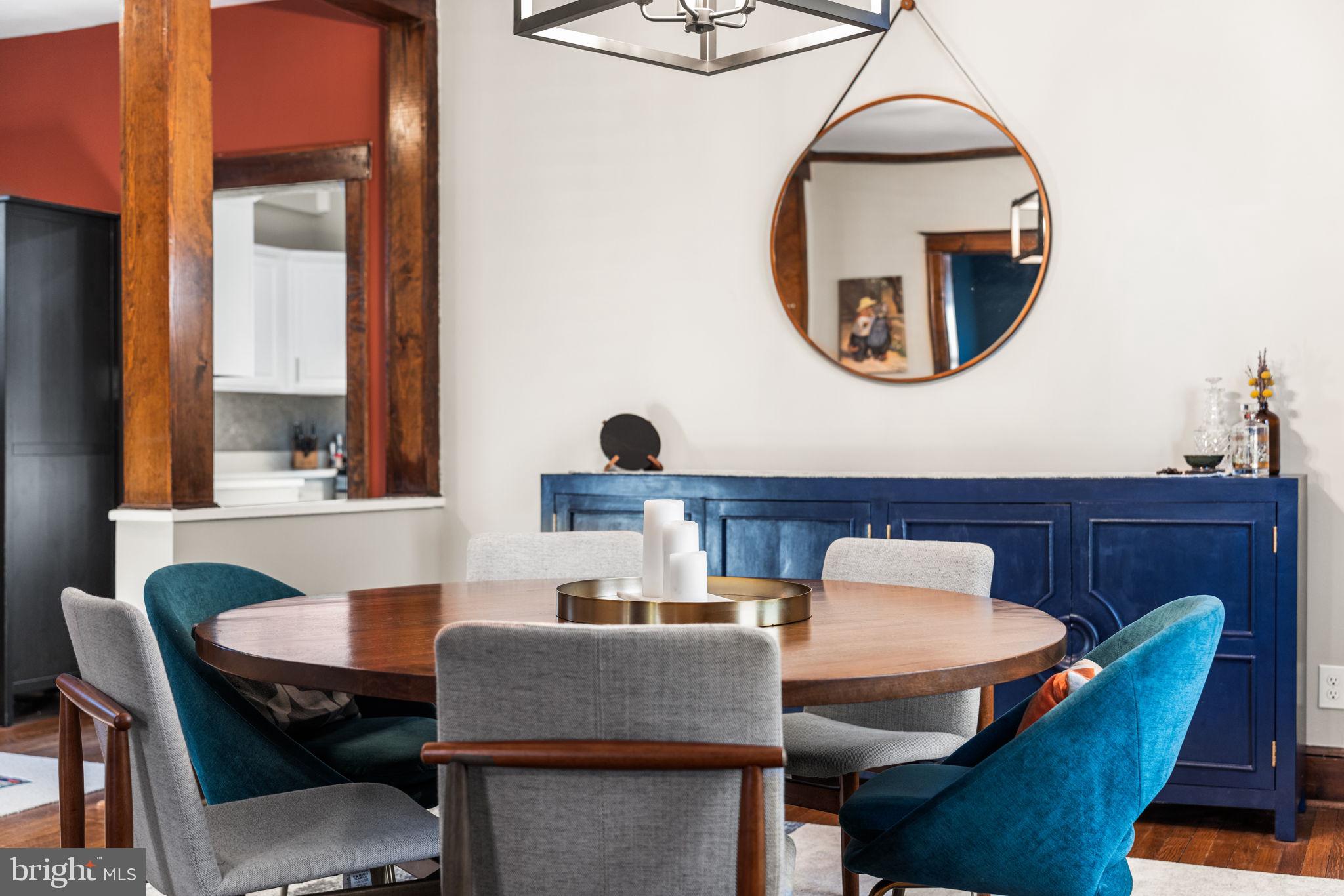 1227 Talbert Street Southeast Washington, DC 20020 - Photo 17 of 64 a dining room with furniture and a mirror