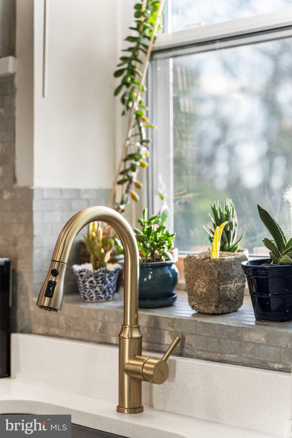 1227 Talbert Street Southeast Washington, DC 20020 - Photo 26 of 64 a vase of flowers sitting on a table