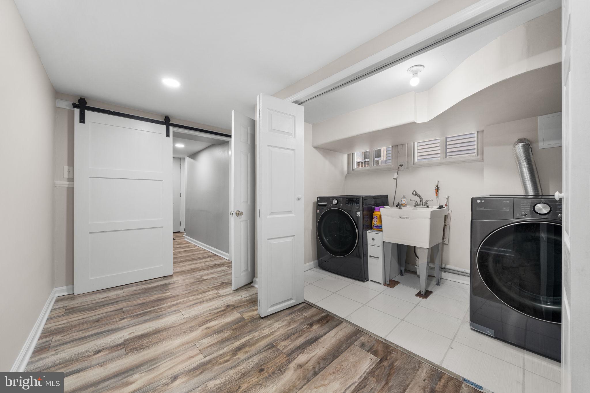 1227 Talbert Street Southeast Washington, DC 20020 - Photo 48 of 64 a view of a storage & utility room with washer and dryer