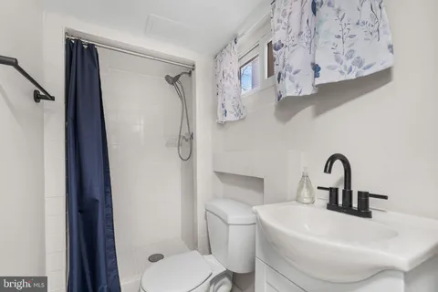 a view of a house with a yard balcony