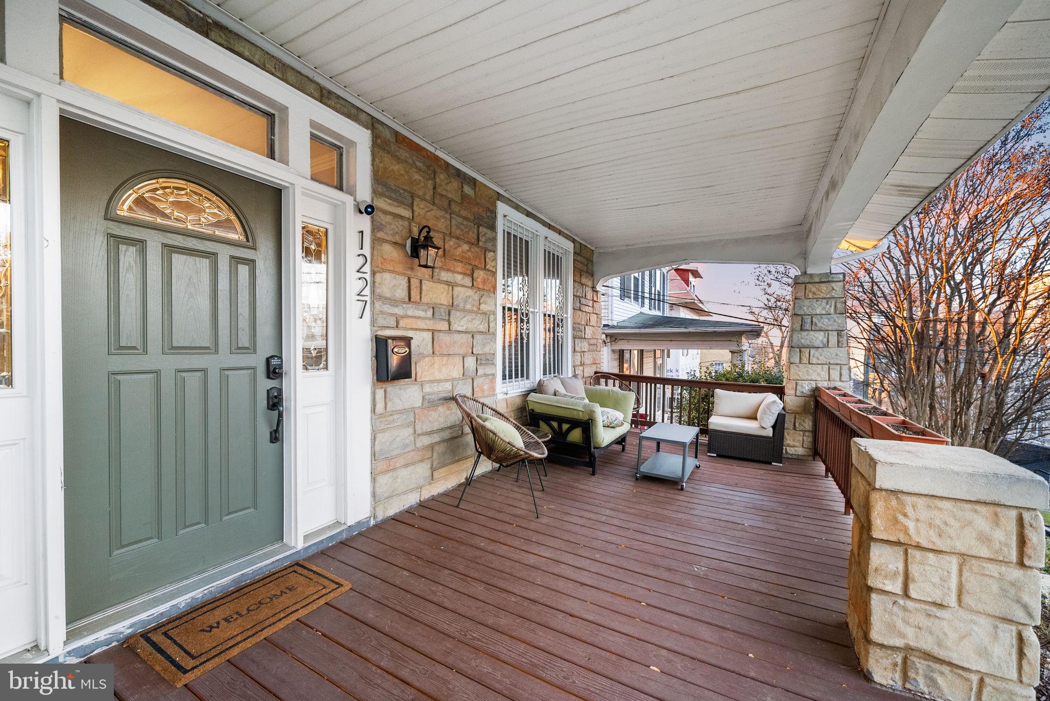 1227 Talbert Street Southeast Washington, DC 20020 - Photo 5 of 64 This grand front porch welcomes you home.