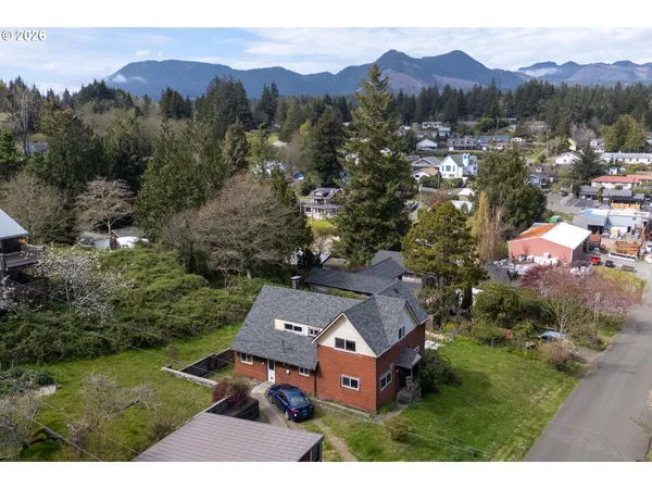 an aerial view of residential house with outdoor space