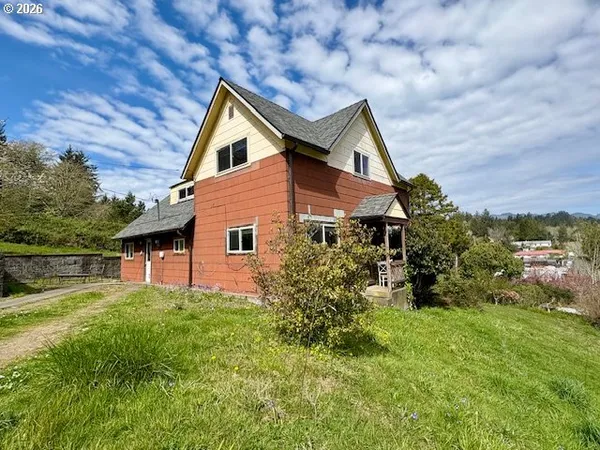 a house view with a garden space