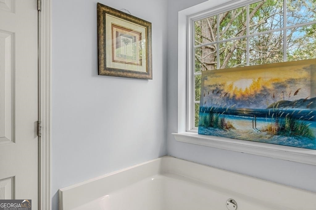 80 Upper Caldwell Road Bowdon, GA 30108 - Photo 17 of 33 a bathroom with a bathtub