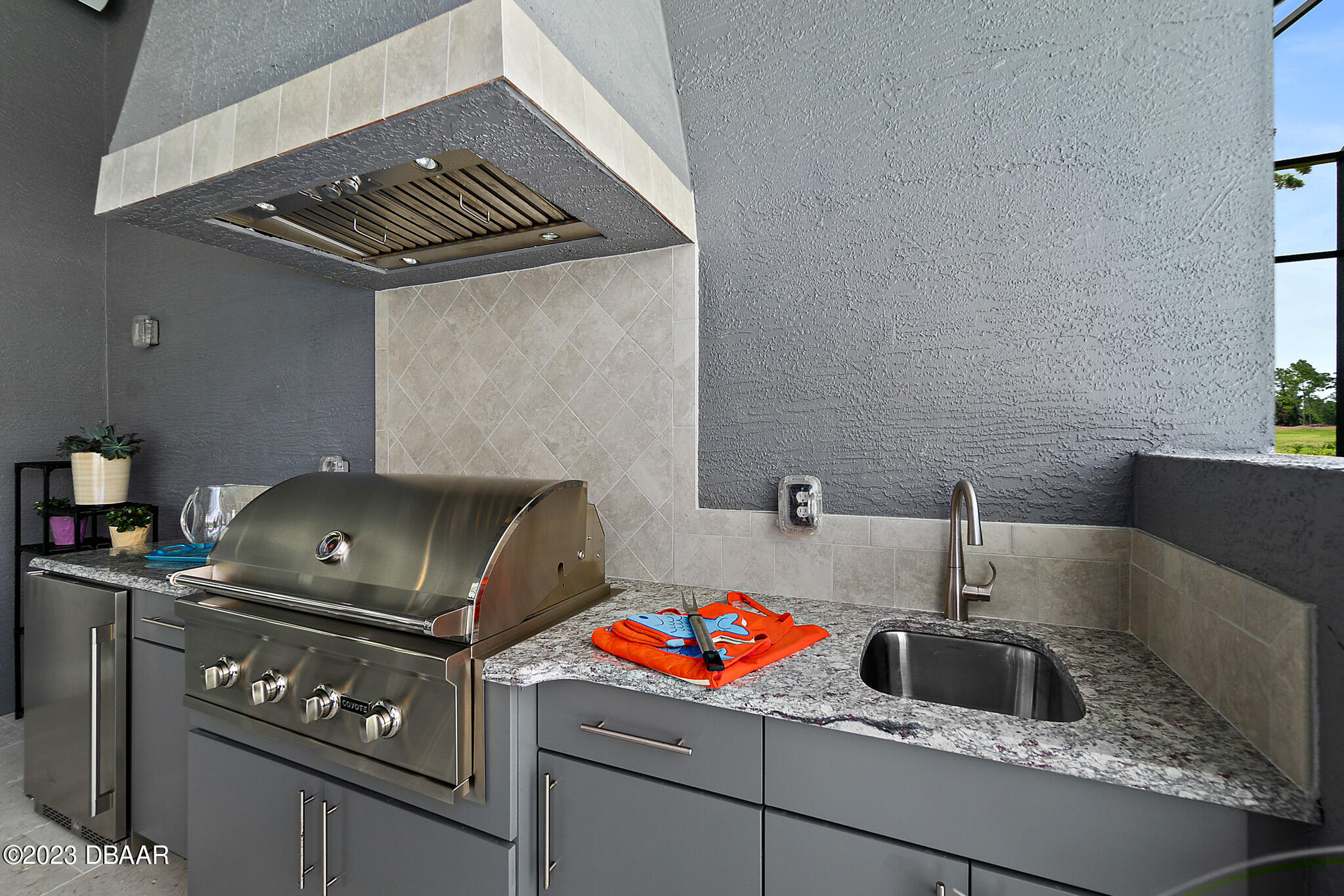 1019 Sudbury Lane Ormond Beach, FL 32174 - Photo 60 of 94 Outdoor Kitchen