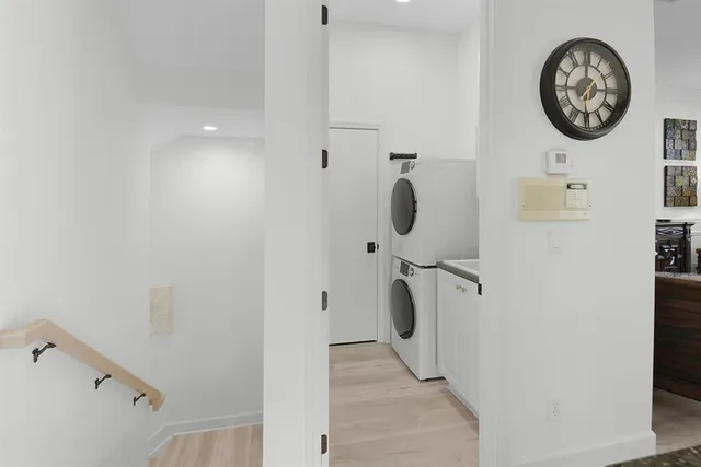 a view of bathroom with shower and mirror