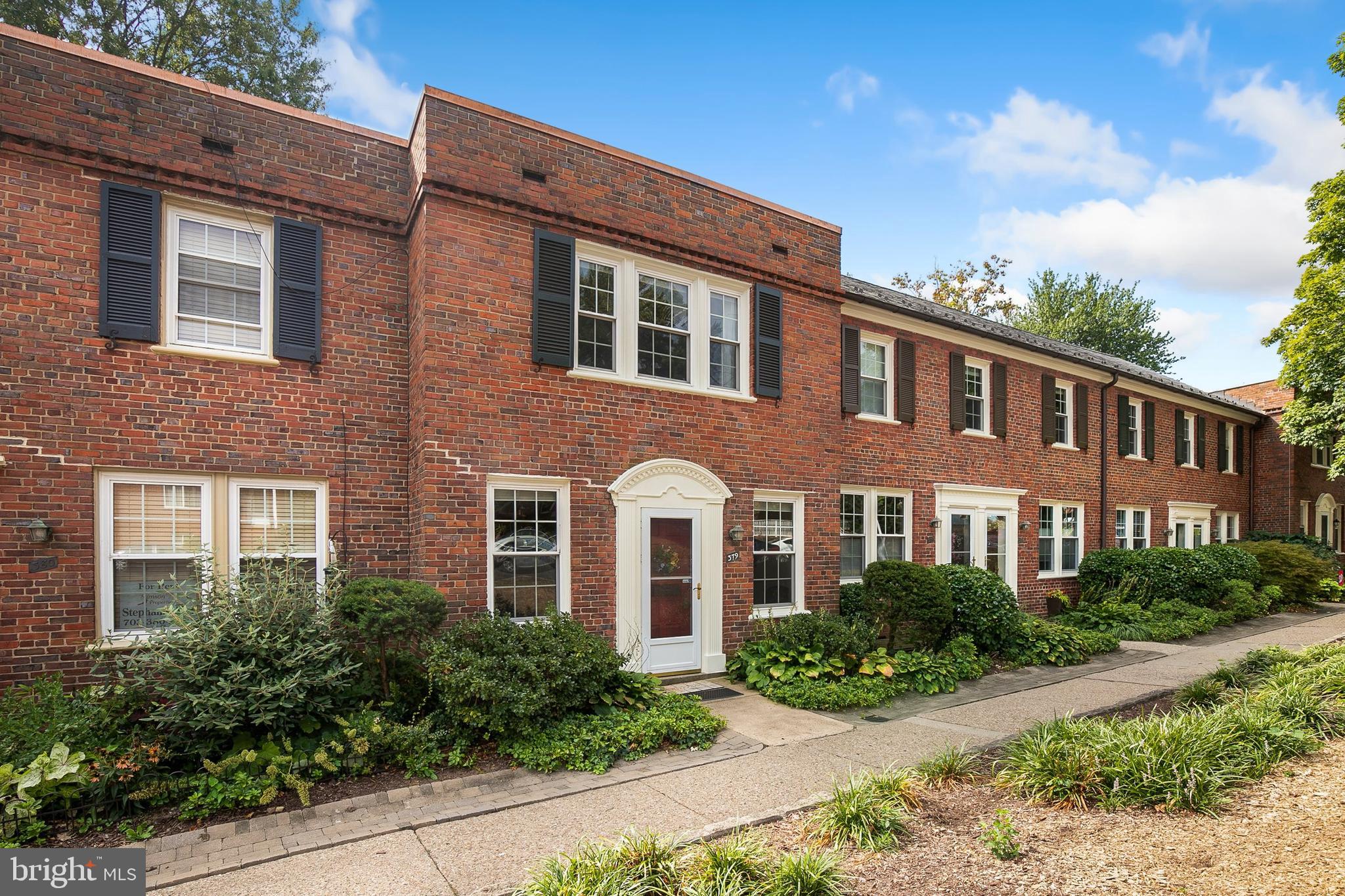2700 13th Road South, Unit 379 Arlington, VA 22204 - Photo 2 of 26 a front view of a house with garden