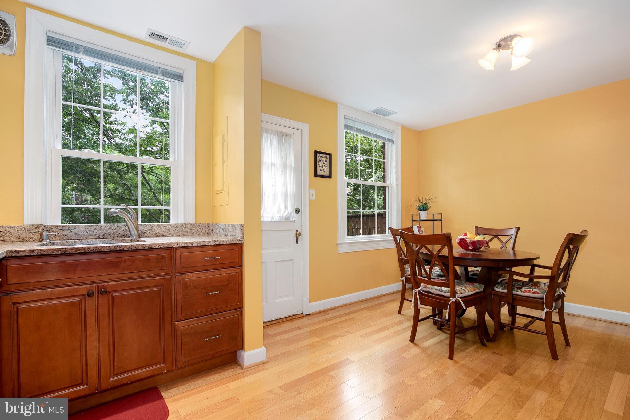 2700 13th Road South, Unit 379 Arlington, VA 22204 - Photo 11 of 26 a view of a dining room with furniture and window