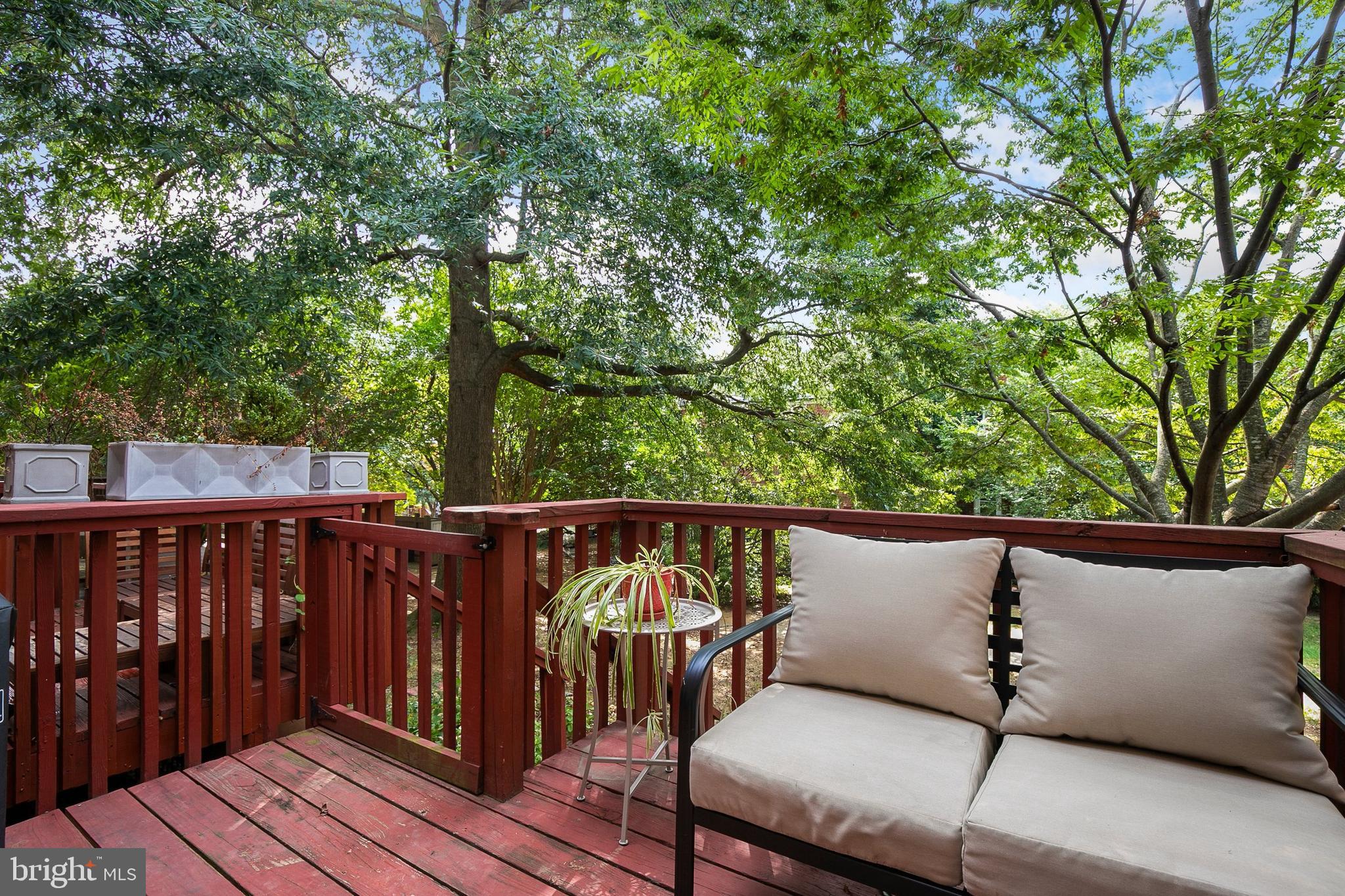 2700 13th Road South, Unit 379 Arlington, VA 22204 - Photo 24 of 26 a view of a deck with a wooden fence and floor