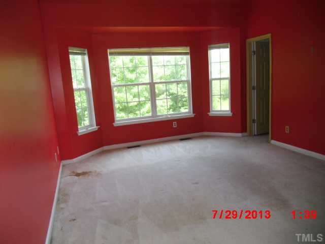 3205 Enchanting Way Raleigh, NC 27616 - Photo 7 of 13 a view of a room with large windows