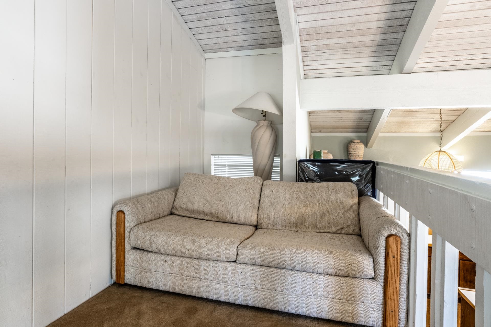 94 John Muir Road, Unit 132 Mammoth Lakes, CA 93546 - Photo 14 of 58 a living room with a couch