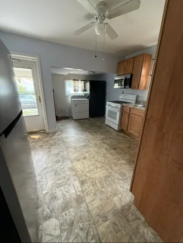 a view of a kitchen with a sink