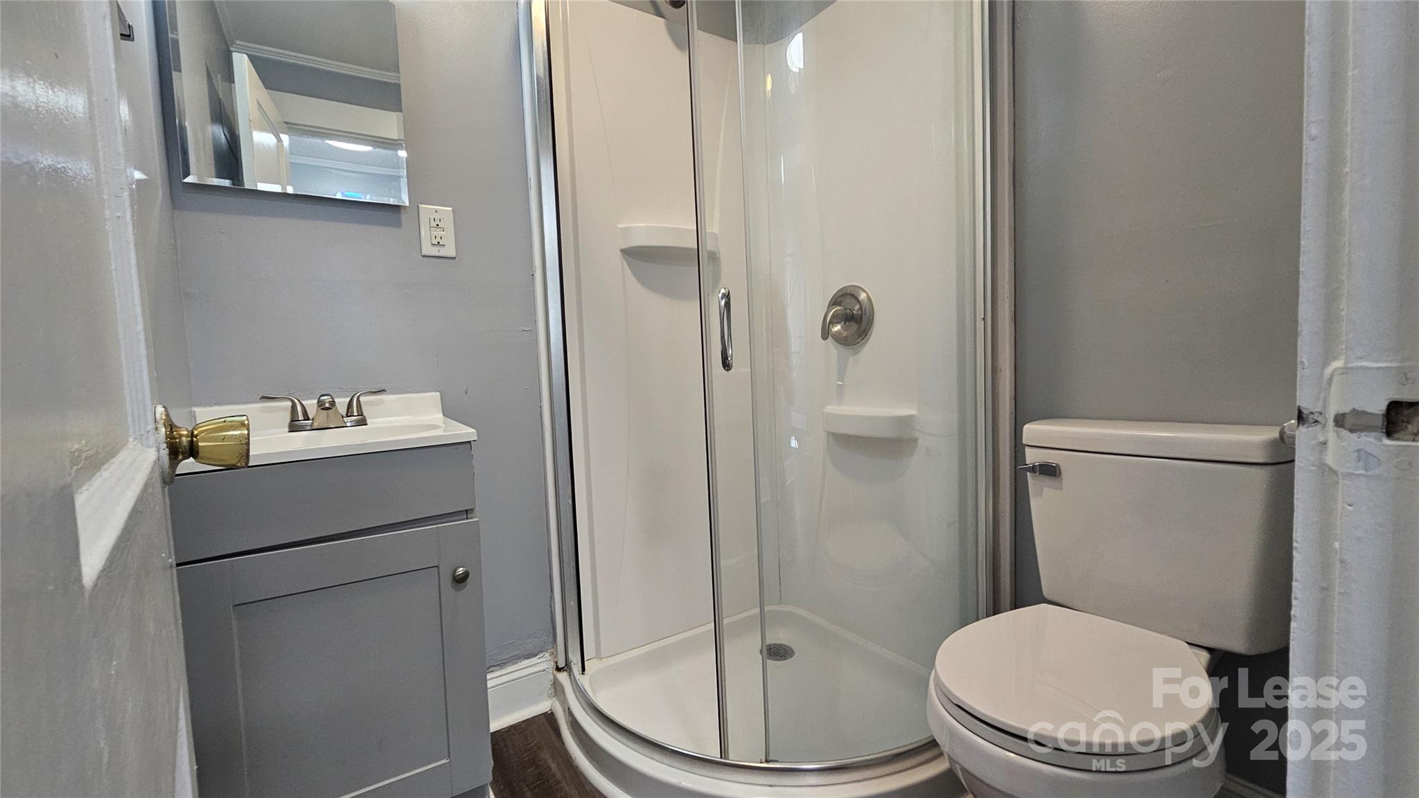 1132 Camden Avenue Rock Hill, SC 29732 - Photo 13 of 26 a bathroom with a toilet and a shower