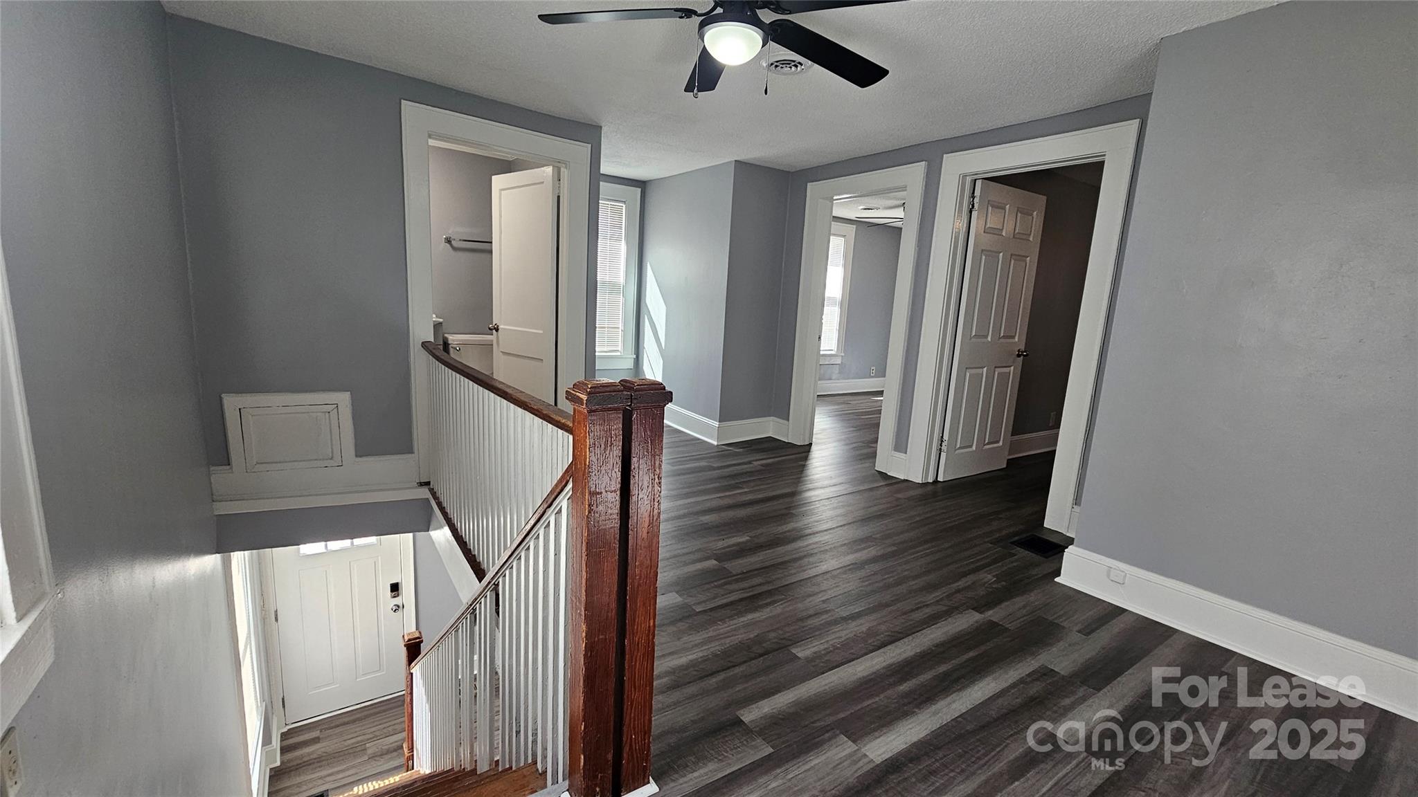 1132 Camden Avenue Rock Hill, SC 29732 - Photo 21 of 26 a view of a hallway with wooden floor and staircase