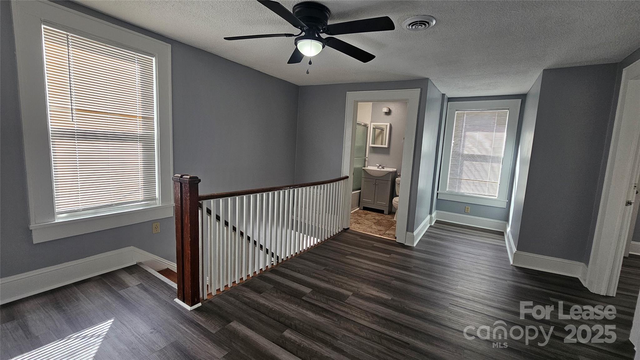 1132 Camden Avenue Rock Hill, SC 29732 - Photo 22 of 26 a view of a hallway with wooden floor and a window