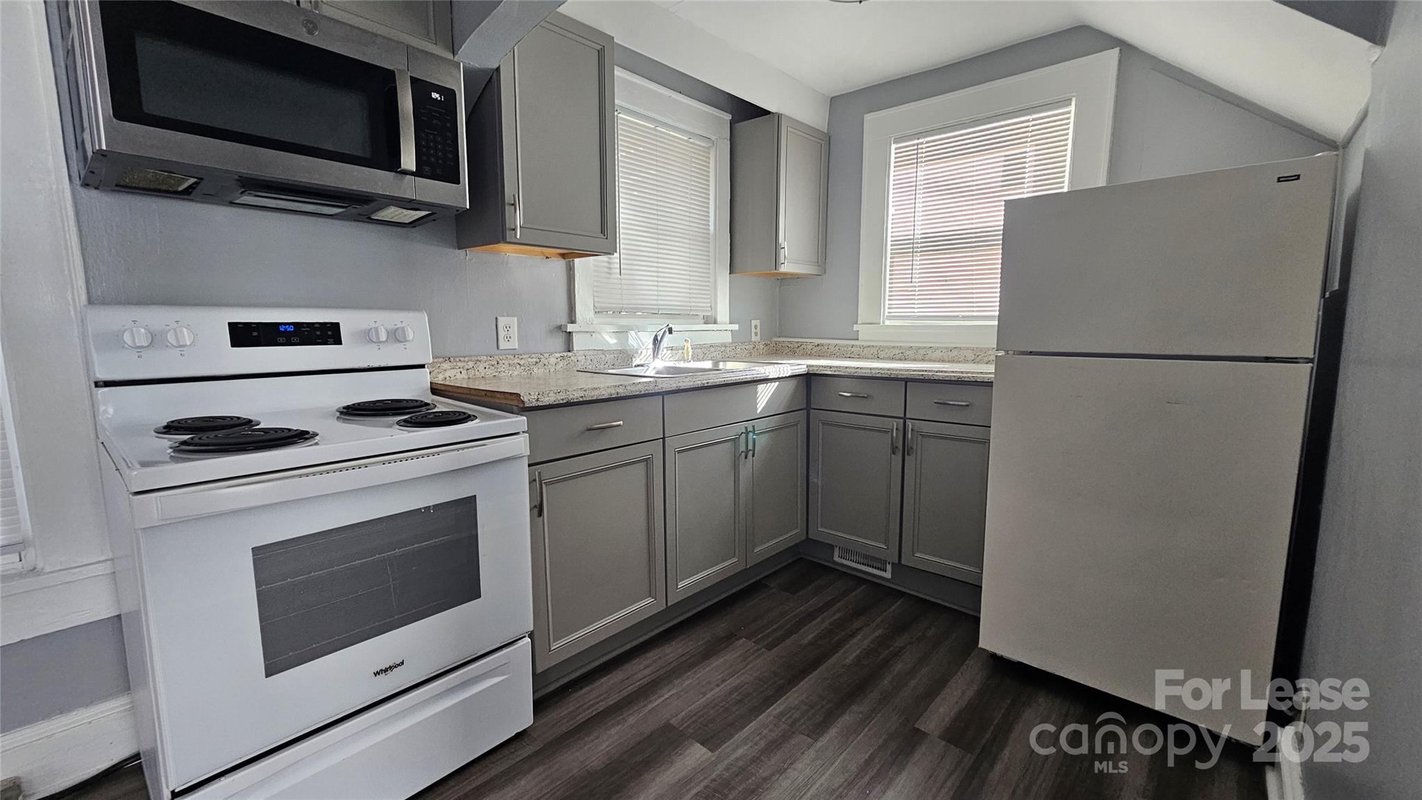 1132 Camden Avenue Rock Hill, SC 29732 - Photo 24 of 26 a kitchen with a sink stove and microwave