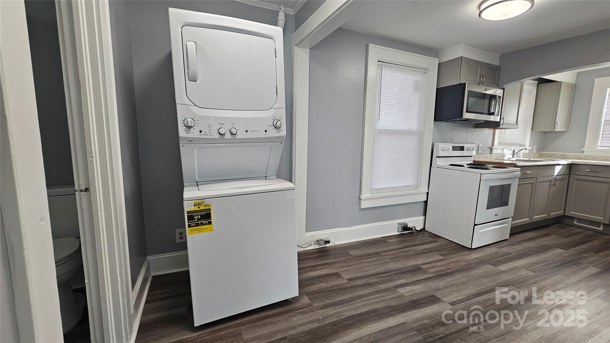 1132 Camden Avenue Rock Hill, SC 29732 - Photo 9 of 26 a utility room with wooden floor washer and dryer