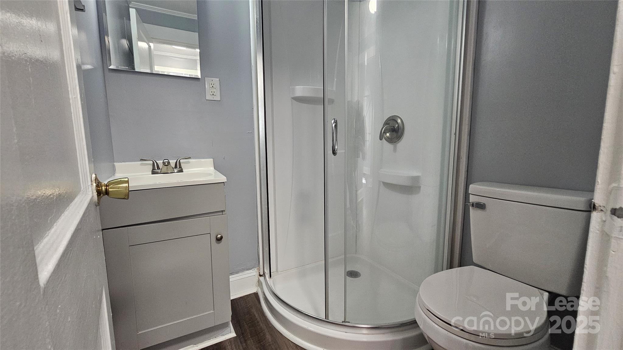 1132 Camden Avenue Rock Hill, SC 29732 - Photo 10 of 26 a white toilet sitting next to a bathroom sink