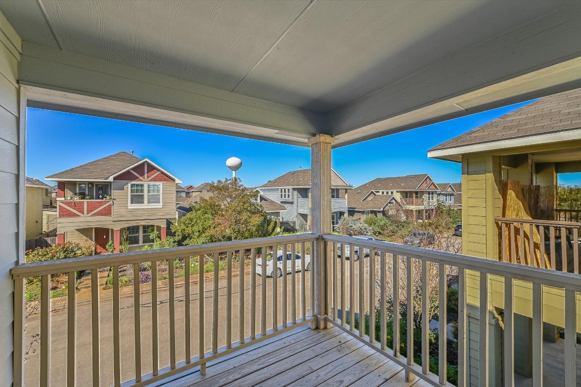 4609 Esper Lane, Unit 323 Austin, TX 78725 - Photo 18 of 20 a view of a houses from a balcony
