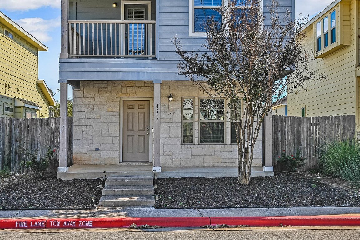 4609 Esper Lane, Unit 323 Austin, TX 78725 - Photo 2 of 20 a front view of a house