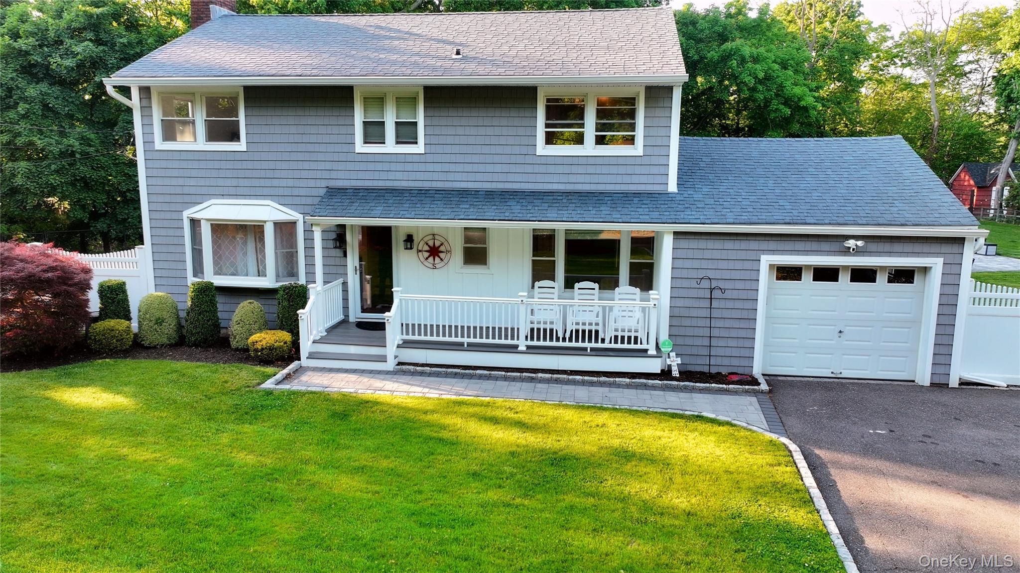 522 Moriches Road St. James, NY 11780 - Photo 2 of 49 a view of a house with a yard porch and sitting area