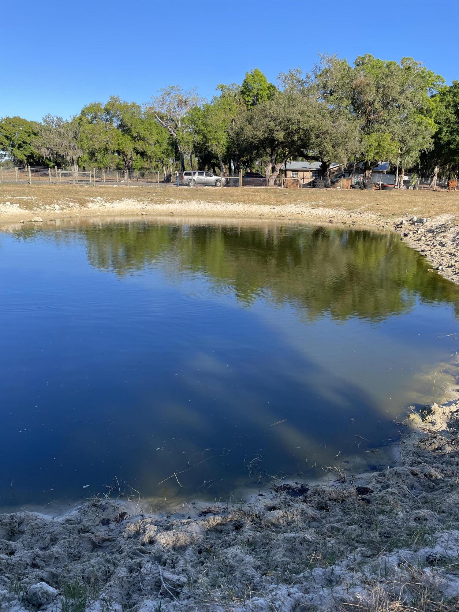 1220 A Road LaBelle, FL 33935 - Photo 33 of 42 a view of a backyard with a lake view