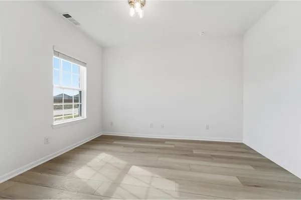 an empty room with a window