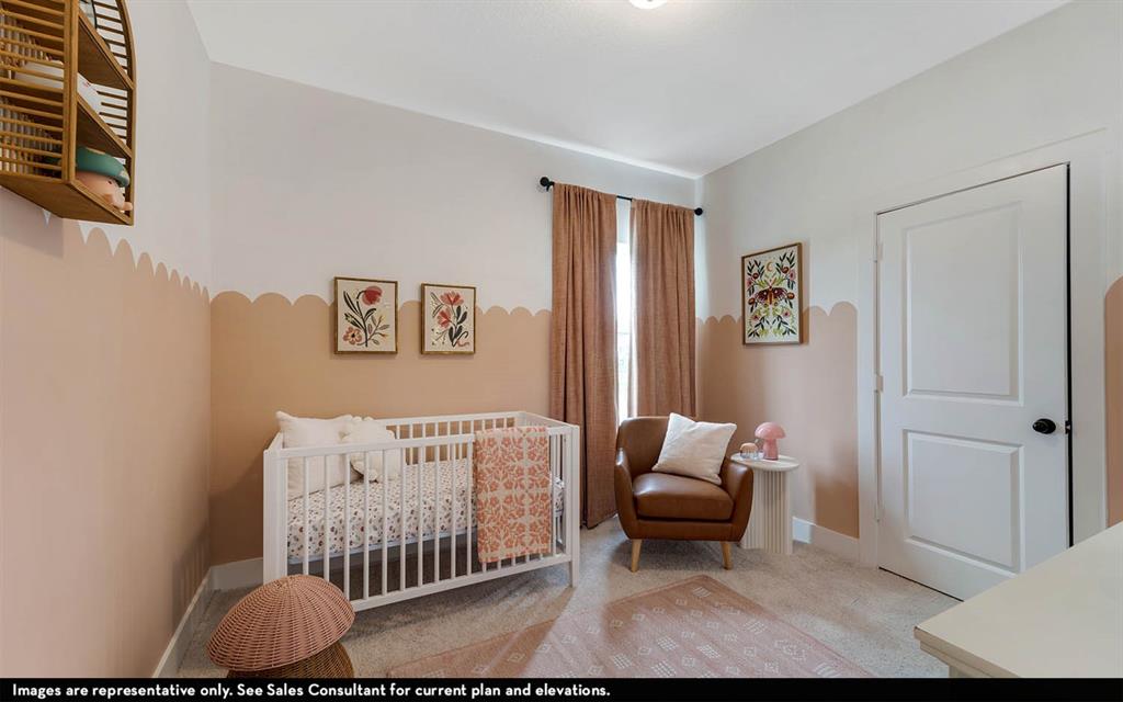 213 Charismatic Road Waxahachie, TX 75165 - Photo 5 of 25 a bedroom with a bed and a window