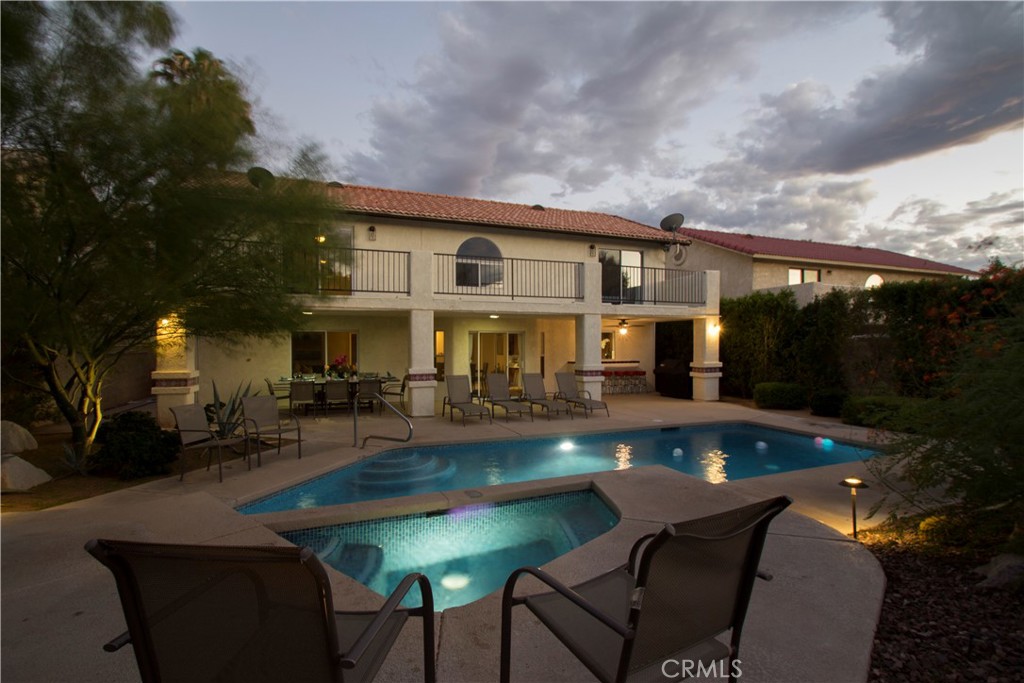 68320 Concepcion Road Cathedral City, CA 92234 - Photo 1 of 1 a front view of house and yard with seating space