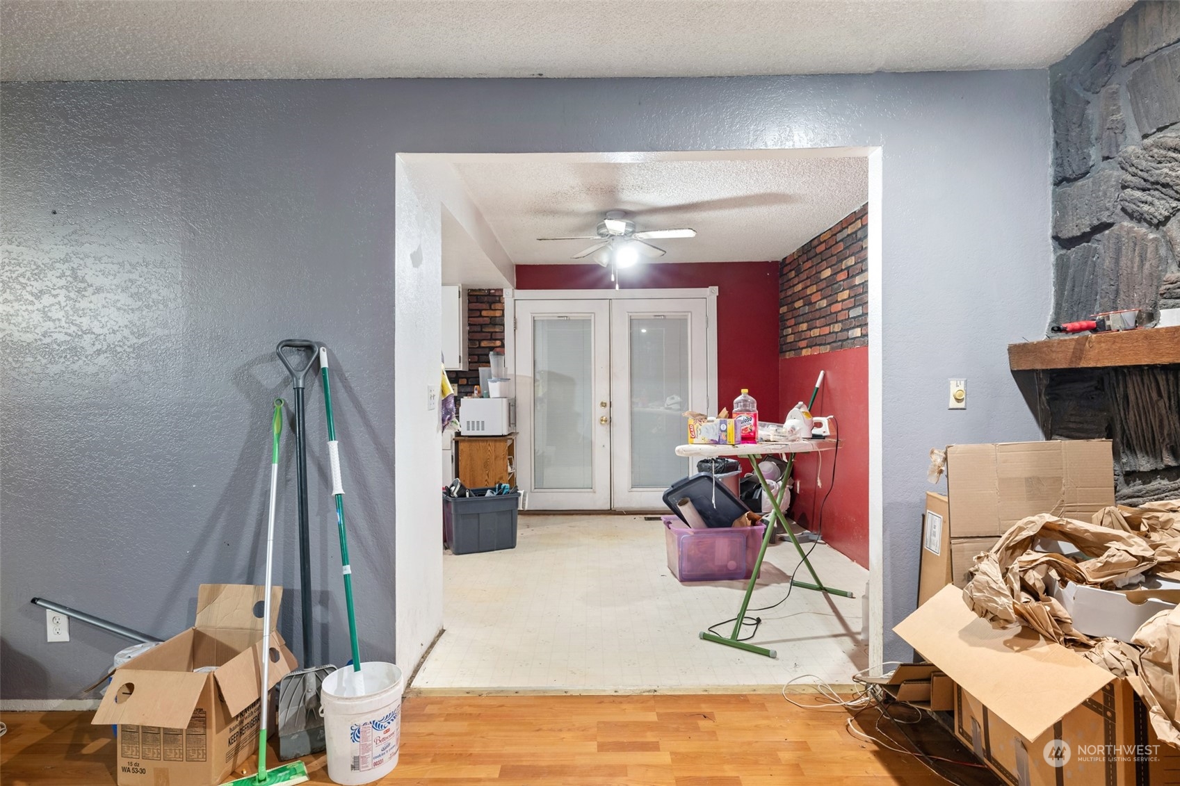 207105 East Finley Road Kennewick, WA 99337 - Photo 6 of 15 a view of a livingroom with furniture and a gym equipment