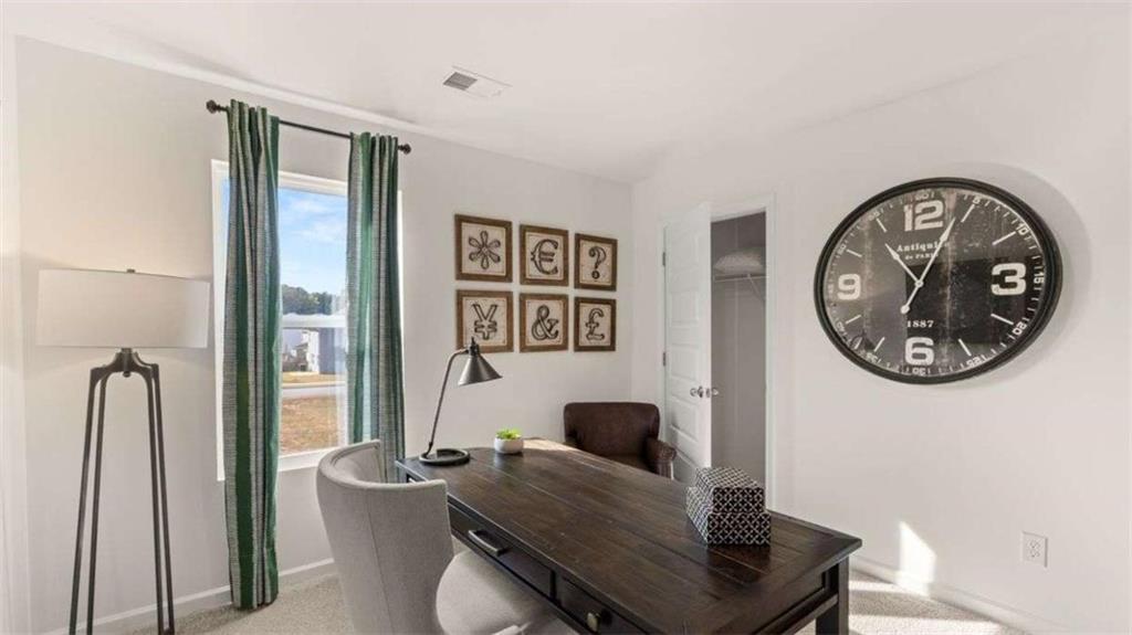 96 White Spruce Way Newnan, GA 30265 - Photo 37 of 43 a view of a workspace with furniture and a window