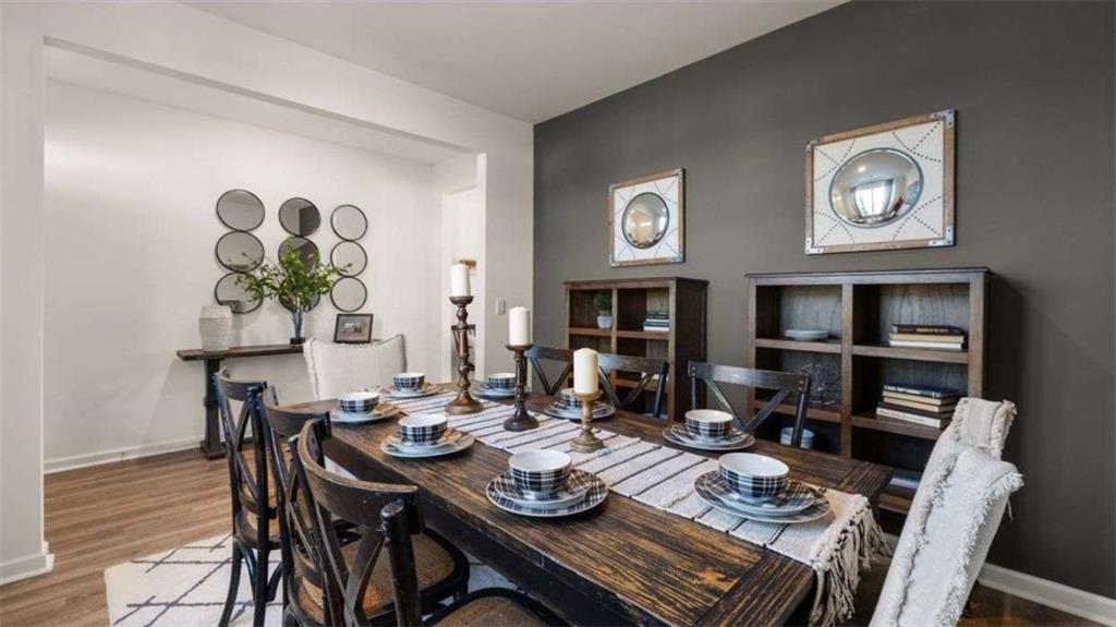 96 White Spruce Way Newnan, GA 30265 - Photo 39 of 43 a view of a dining room with furniture window and wooden floor