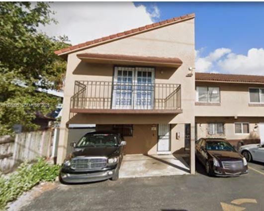 5631 West 28th Avenue, Unit 1 Hialeah, FL 33016 - Photo 1 of 18 a car parked in front of a house